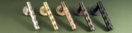 This is an image of the NEW Alexander & Wilks Diamond Cut Door Handle range