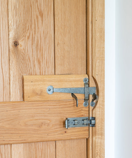 Image showing a Pewter Suffolk Latch on a Ledge & Brace Door made by From the Anvil 