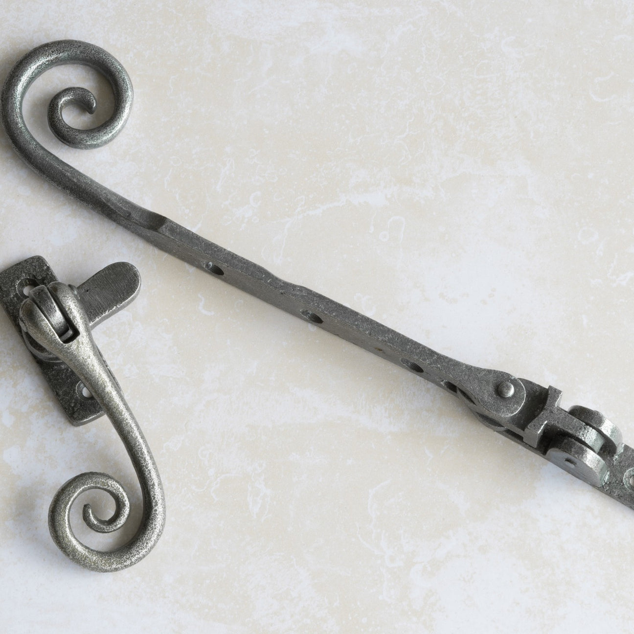 Image showing a casement stay and fastener from Frelan Hardware in Pewter.  Available to order from Trade Door Handles, Kendal