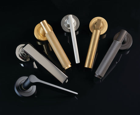 Image showing a range of door handles on roses by Carlisle Brass available to order from Trade Door Handles