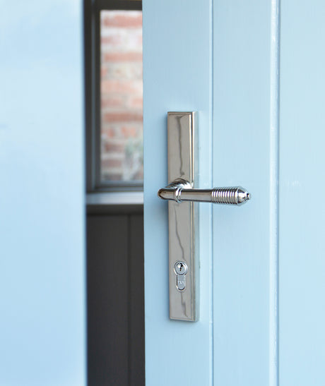 Image showing a polished Chrome Multipoint locking Door Handle made by From the Anvil