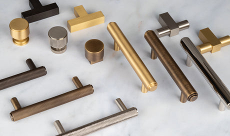 Image showing a collection of kitchen and cabinet knobs and pull handles from Burlington.  Available to order from Trade Door Handles, Kendal.