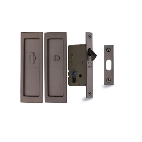Image showing a Bathroom Sliding Door Lock by M.Marcus in Matt Bronze.  Available to order from Trade Door Handles in Kendal