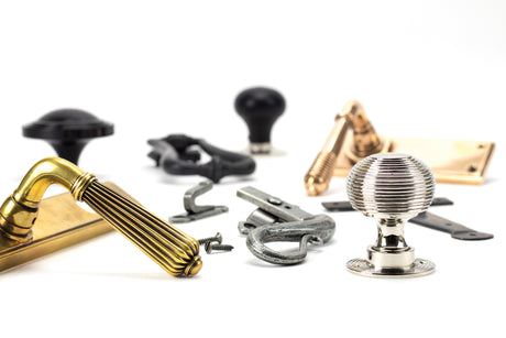 Image showing a range of ironmongery by From The Anvil in a range of finishes.  Available to order from Trade Door Handles in Kendal