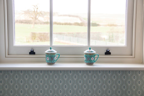 Image showing a sash window with From the Anvil Sash Hooks in Bronze