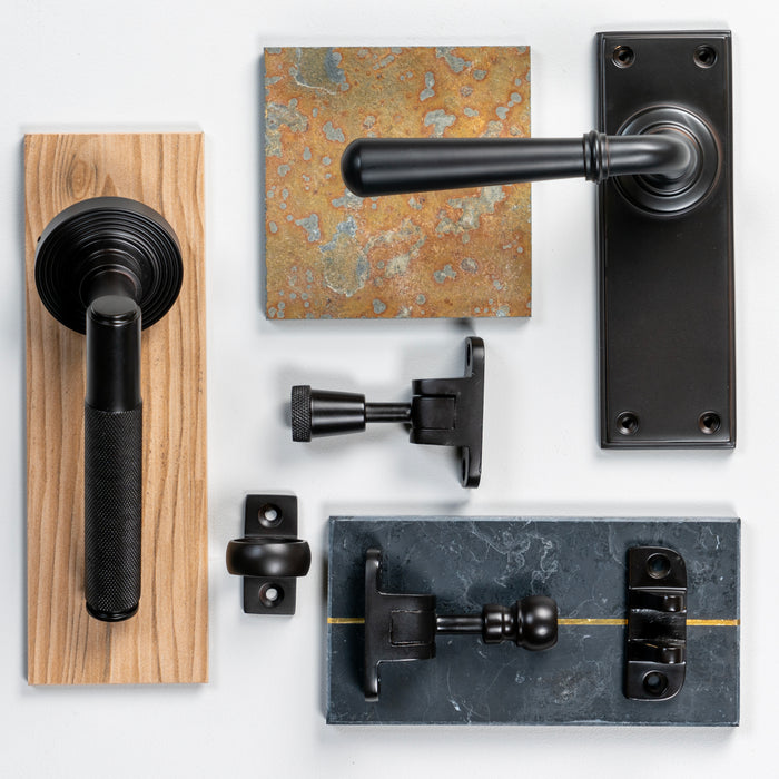 Image showing a range of window and door furniture made by From the Anvil in an Aged Bronze finish