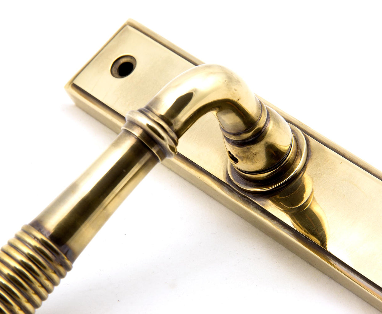 From The Anvil - Aged Brass Reeded Slimline Lever Espag. Lock Set | Sku. 33039 | Trade Door Handles.