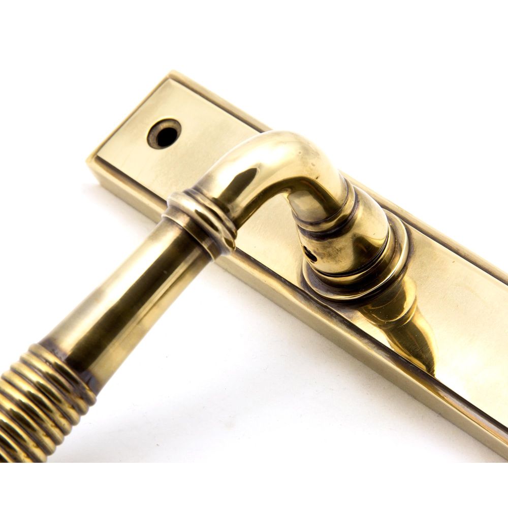 From The Anvil - Aged Brass Reeded Slimline Lever Espag. Lock Set | Sku. 33039 | Trade Door Handles.