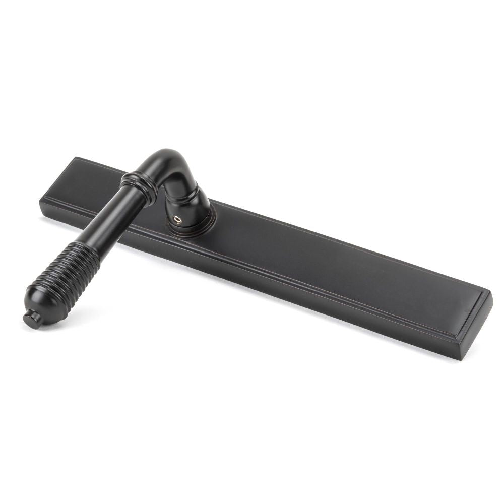 From The Anvil - Aged Bronze Reeded Slimline Lever Espag. Latch Set | Sku. 45427 | Trade Door Handles.