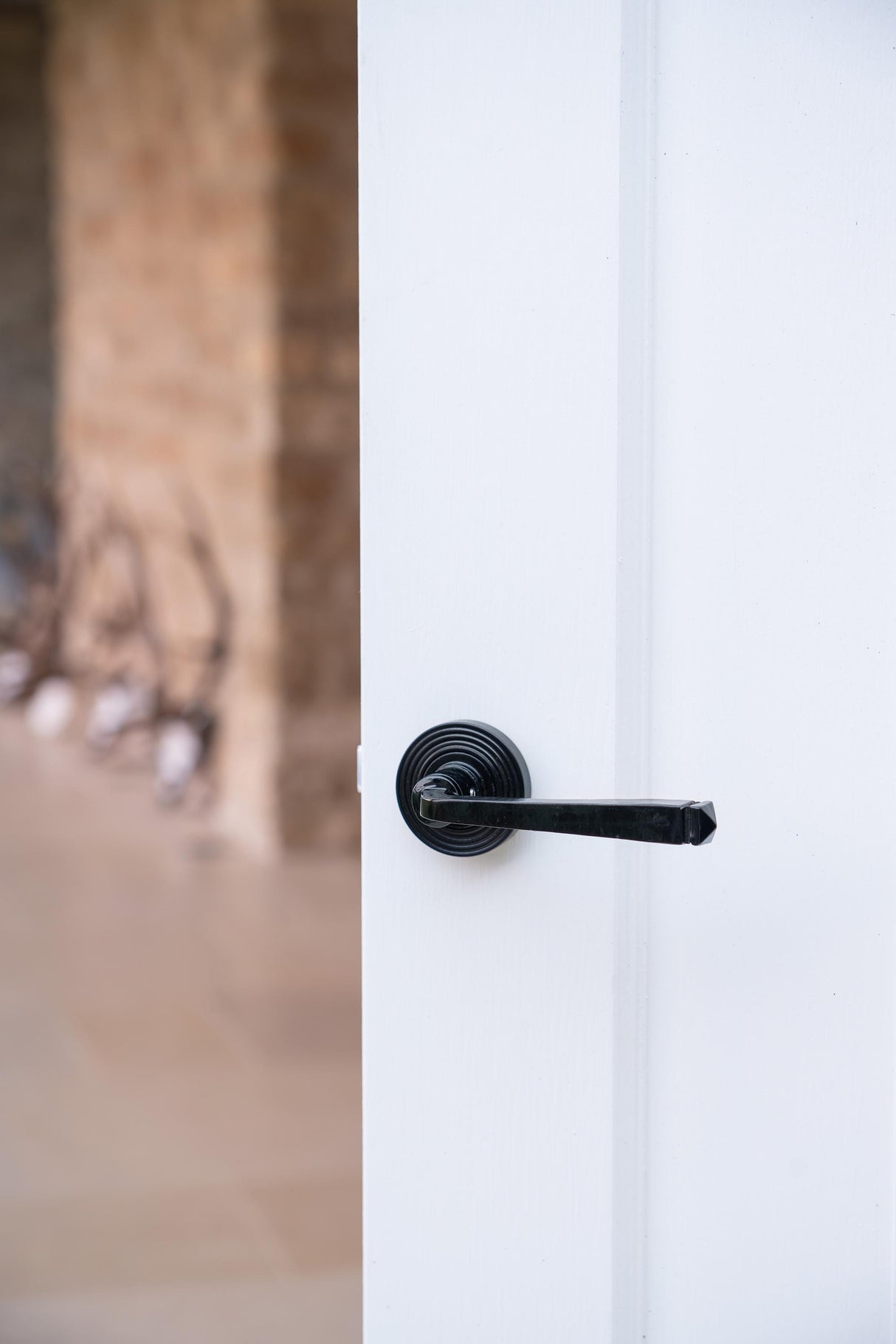 From The Anvil - Black Avon Round Lever on Rose Set (Beehive) | Sku. 45625 | Trade Door Handles.