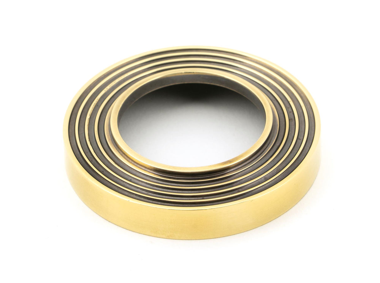 From The Anvil - Aged Brass Newbury Lever on Rose Set (Beehive) | Sku. 45757 | Trade Door Handles.