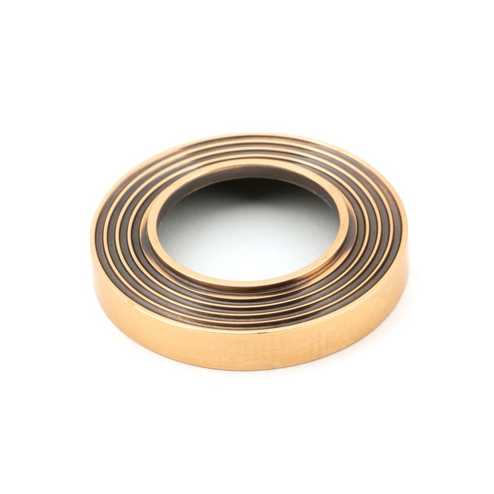 From The Anvil - Polished Bronze Avon Round Lever on Rose Set (Beehive) | Sku. 46095 | Trade Door Handles.