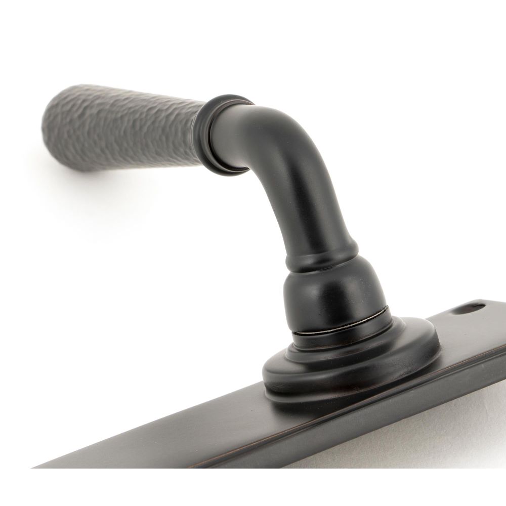 From The Anvil - Aged Bronze Hammered Newbury Lever Bathroom Set | Sku. 46223 | Trade Door Handles.