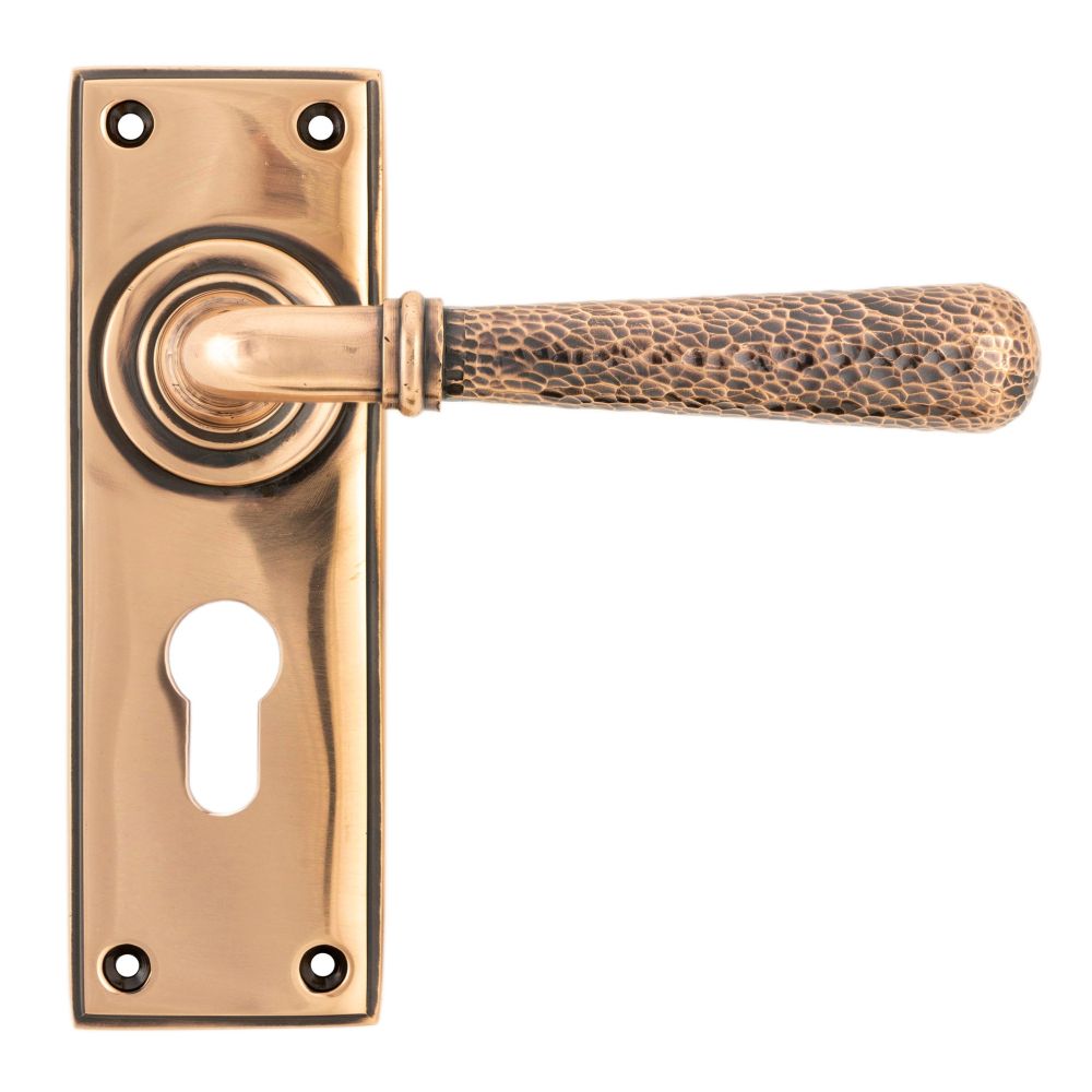 From The Anvil - Polished Bronze Hammered Newbury Lever Euro Lock Set | Sku. 46228 | Trade Door Handles.