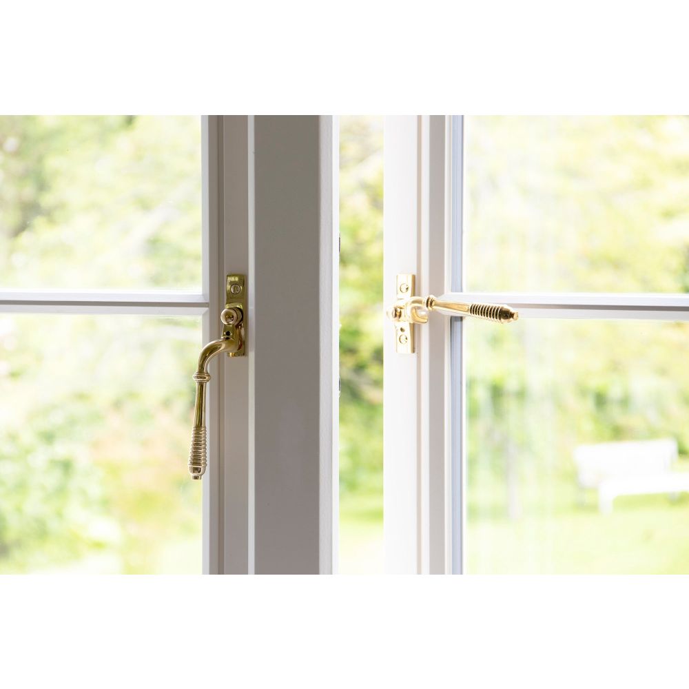 From The Anvil - Polished Brass Reeded Espag - RH | Sku. 46709 | Trade Door Handles.