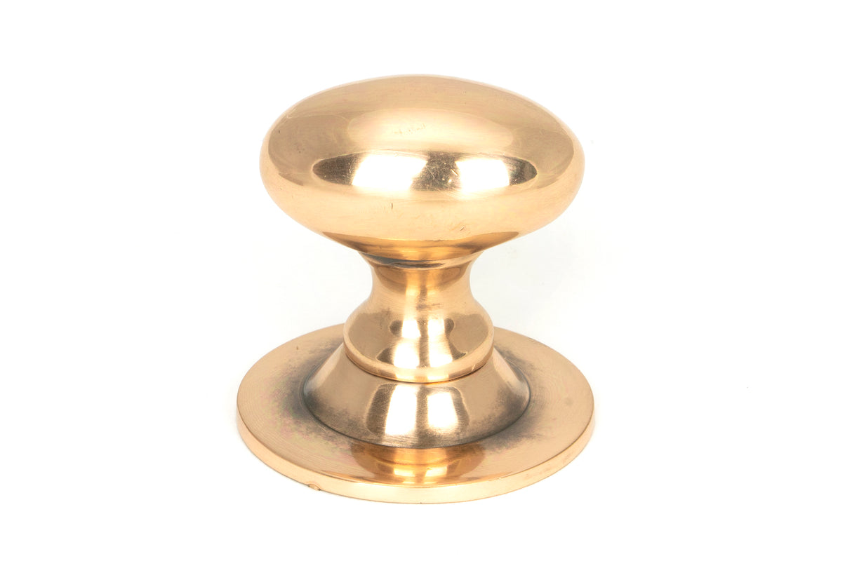 From The Anvil - Polished Bronze Oval Cabinet Knob 33mm | Sku. 46727 | Trade Door Handles.