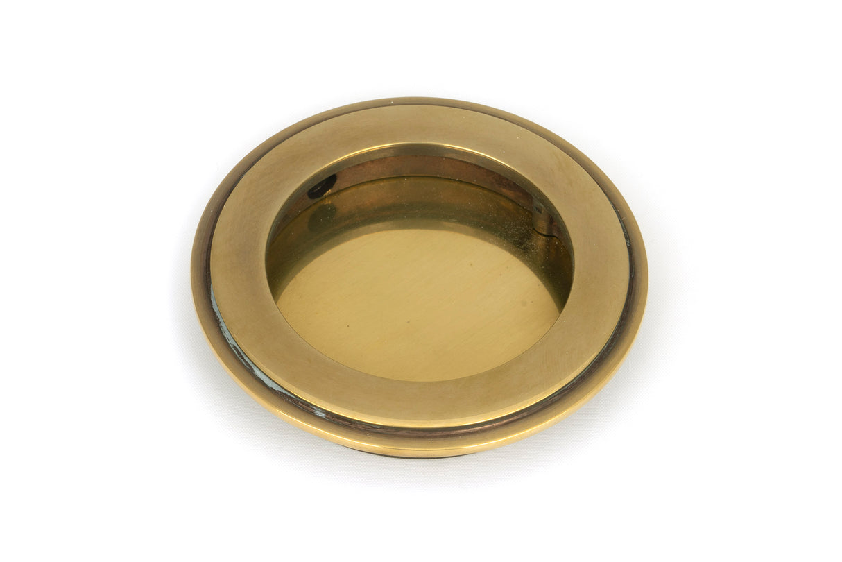 From The Anvil - Aged Brass 75mm Art Deco Round Pull | Sku. 48317 | Trade Door Handles.