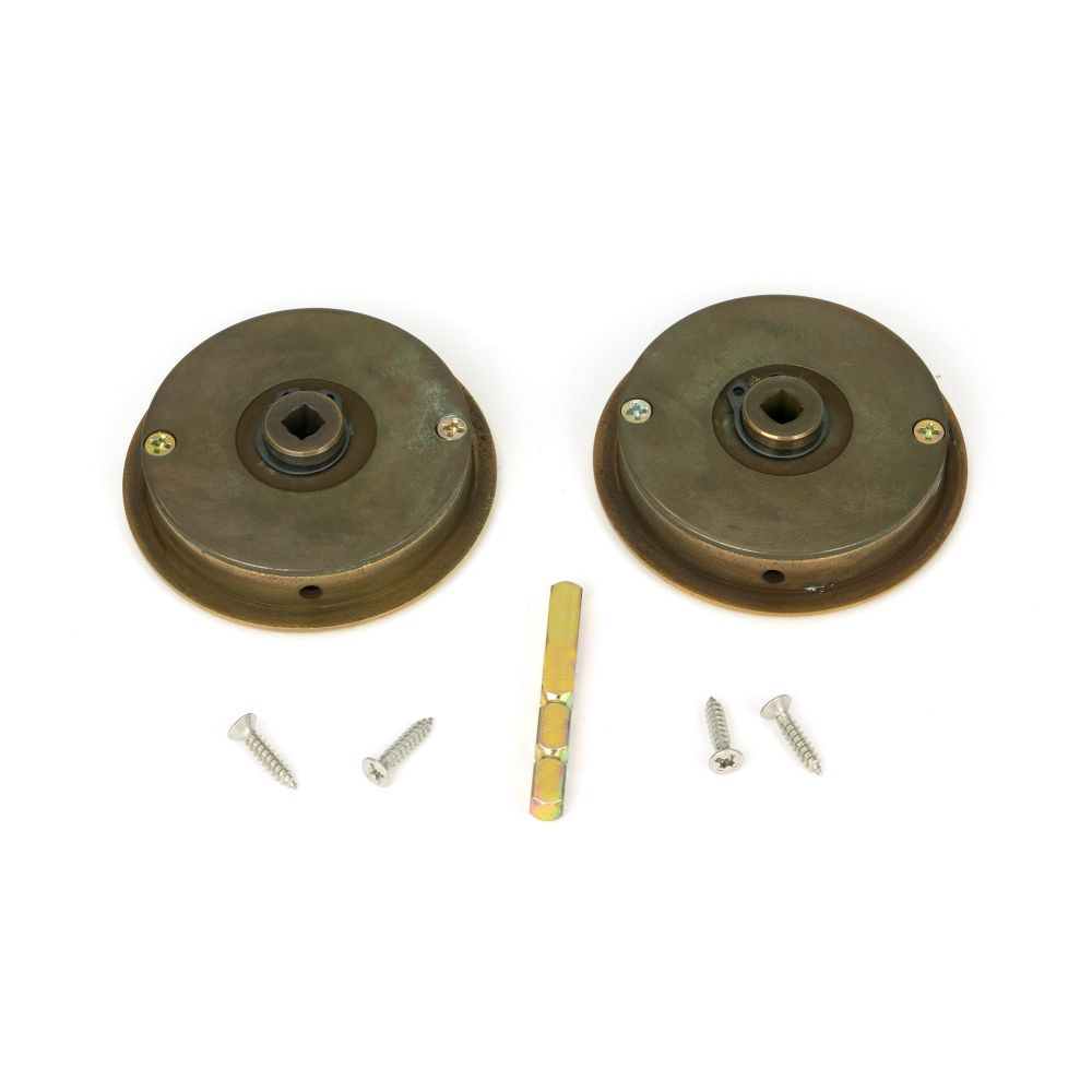 From The Anvil - Aged Brass 60mm Art Deco Round Pull - Privacy Set | Sku. 48324 | Trade Door Handles.