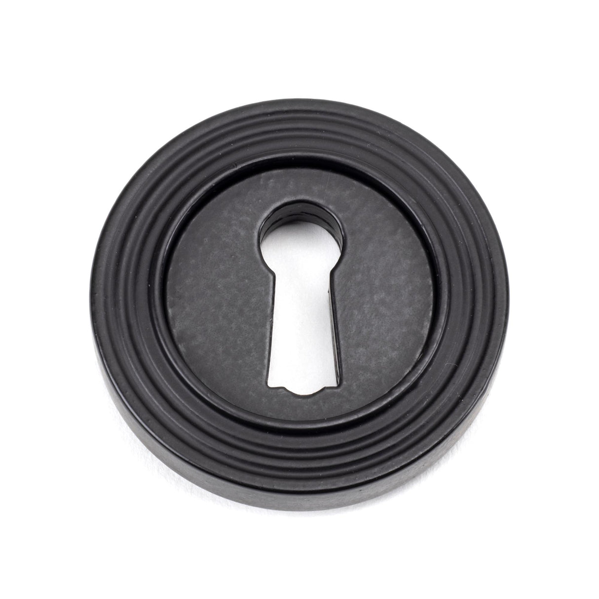 From The Anvil - Matt Black Round Escutcheon (Beehive) | Sku. 49538 | Trade Door Handles.