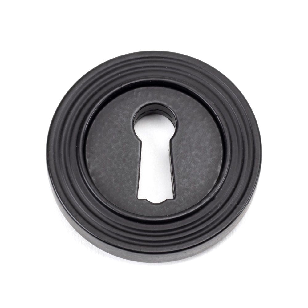 From The Anvil - Matt Black Round Escutcheon (Beehive) | Sku. 49538 | Trade Door Handles.