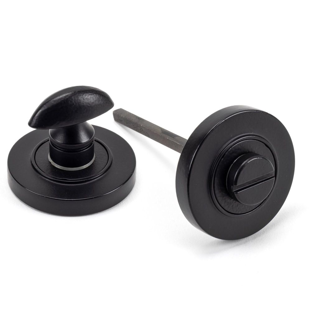From The Anvil - Matt Black Round Thumbturn Set (Plain) | Sku. 49544 | Trade Door Handles.