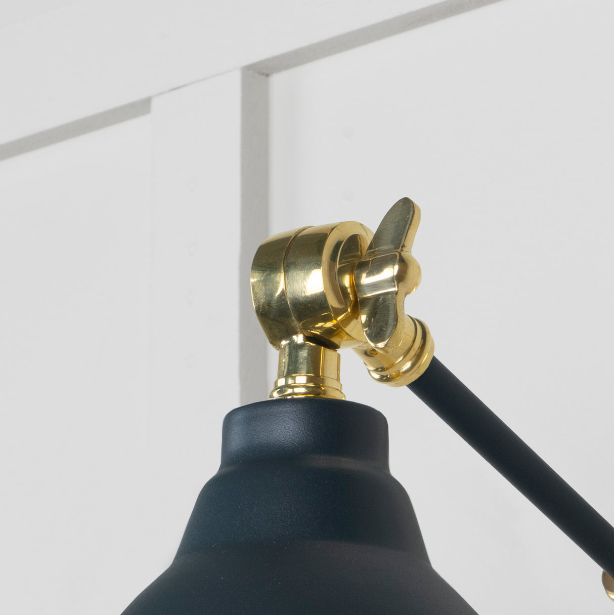 From The Anvil - Smooth Brass Brindley Wall Light in Soot | Sku. 49716SSO | Trade Door Handles.