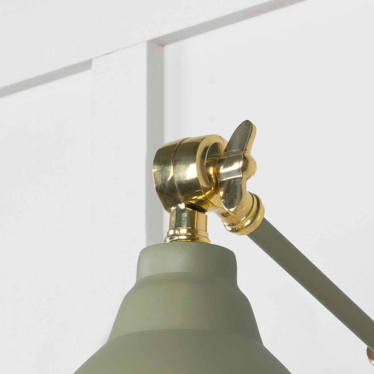 From The Anvil - Smooth Brass Brindley Wall Light in Tump | Sku. 49716STU | Trade Door Handles.