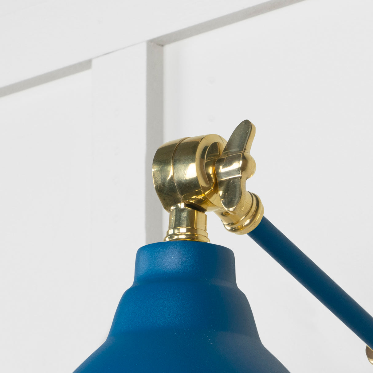 From The Anvil - Smooth Brass Brindley Wall Light in Upstream | Sku. 49716SU | Trade Door Handles.