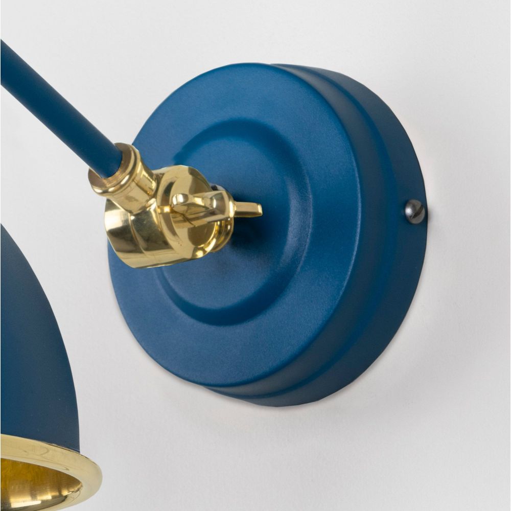 From The Anvil - Smooth Brass Brindley Wall Light in Upstream | Sku. 49716SU | Trade Door Handles.