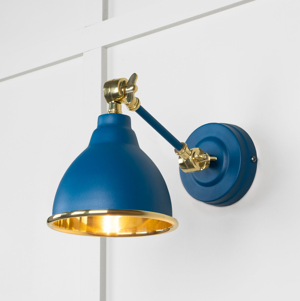 From The Anvil - Smooth Brass Brindley Wall Light in Upstream | Sku. 49716SU | Trade Door Handles.