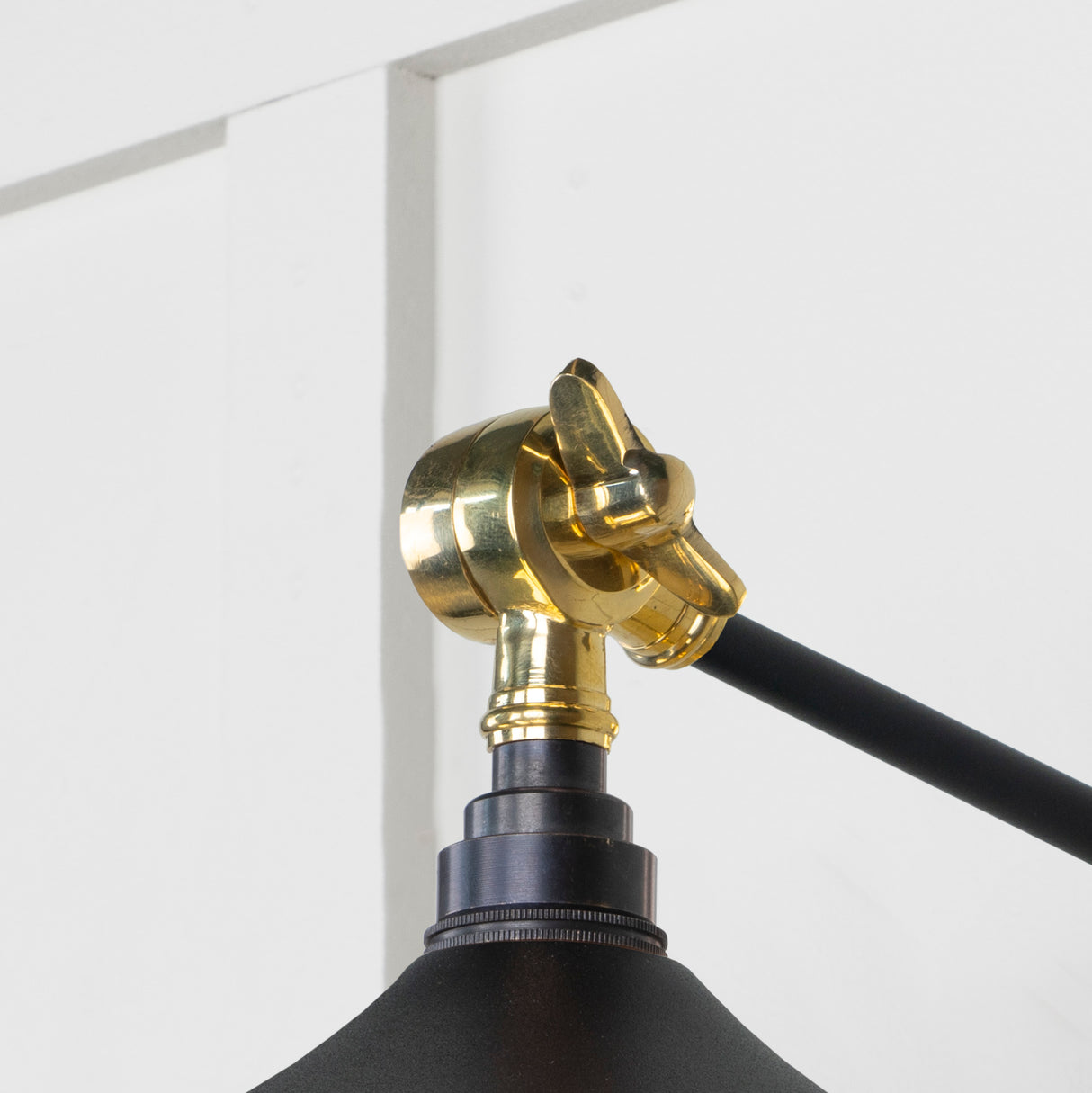 From The Anvil - Smooth Brass Flora Wall Light in Elan Black | Sku. 49725SEB | Trade Door Handles.