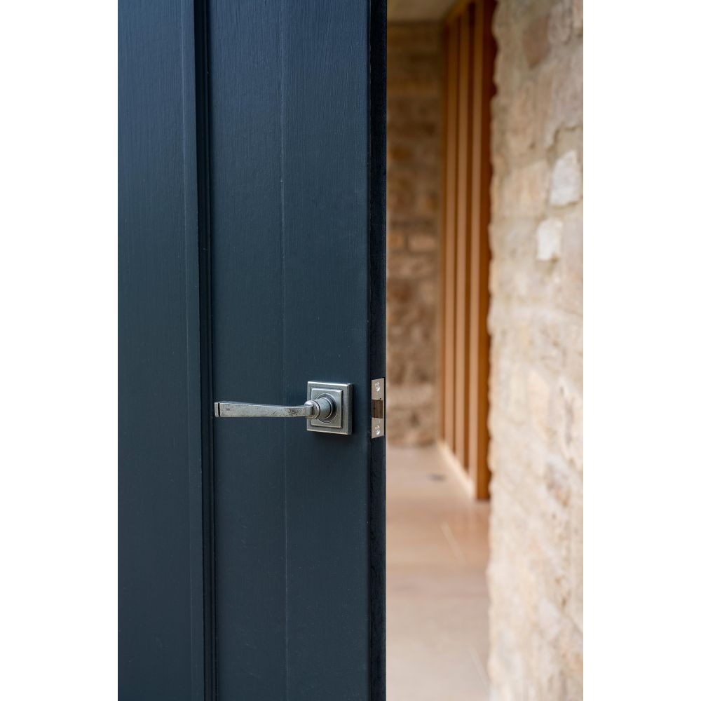 From The Anvil - Pewter Avon Round Lever on Rose Set (Square) - Unsprung | Sku. 49968 | Trade Door Handles.