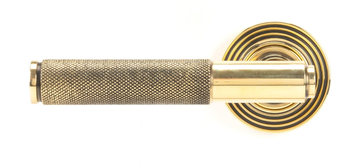 From The Anvil - Aged Brass Brompton Lever on Rose Set (Beehive) - Unsprung | Sku. 49995 | Trade Door Handles.