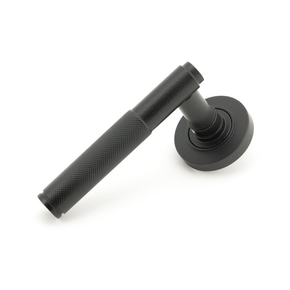 From The Anvil - Matt Black Brompton Lever on Rose Set (Plain) - Unsprung | Sku. 50009 | Trade Door Handles.