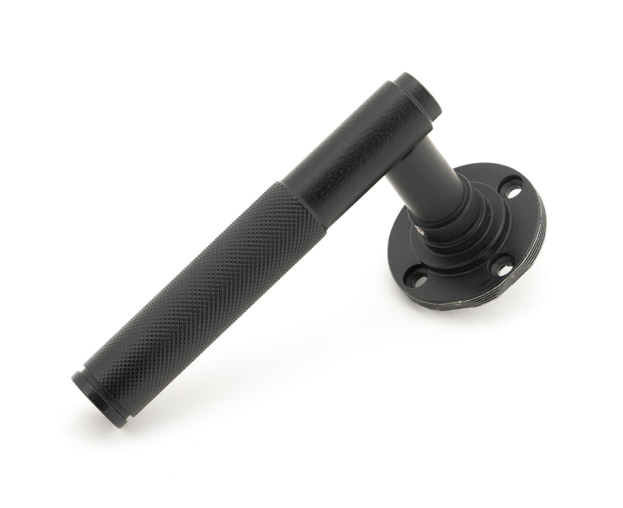 From The Anvil - Matt Black Brompton Lever on Rose Set (Beehive) - Unsprung | Sku. 50011 | Trade Door Handles.