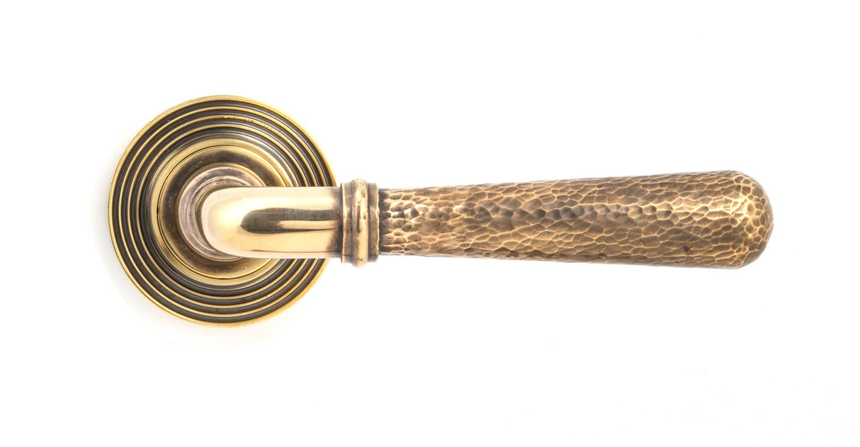 From The Anvil - Aged Brass Hammered Newbury Lever on Rose Set (Beehive) - Unsprung | Sku. 50039 | Trade Door Handles.