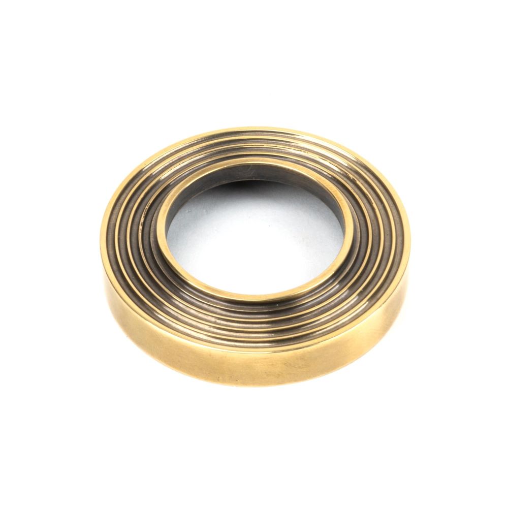 From The Anvil - Aged Brass Hammered Newbury Lever on Rose Set (Beehive) - Unsprung | Sku. 50039 | Trade Door Handles.