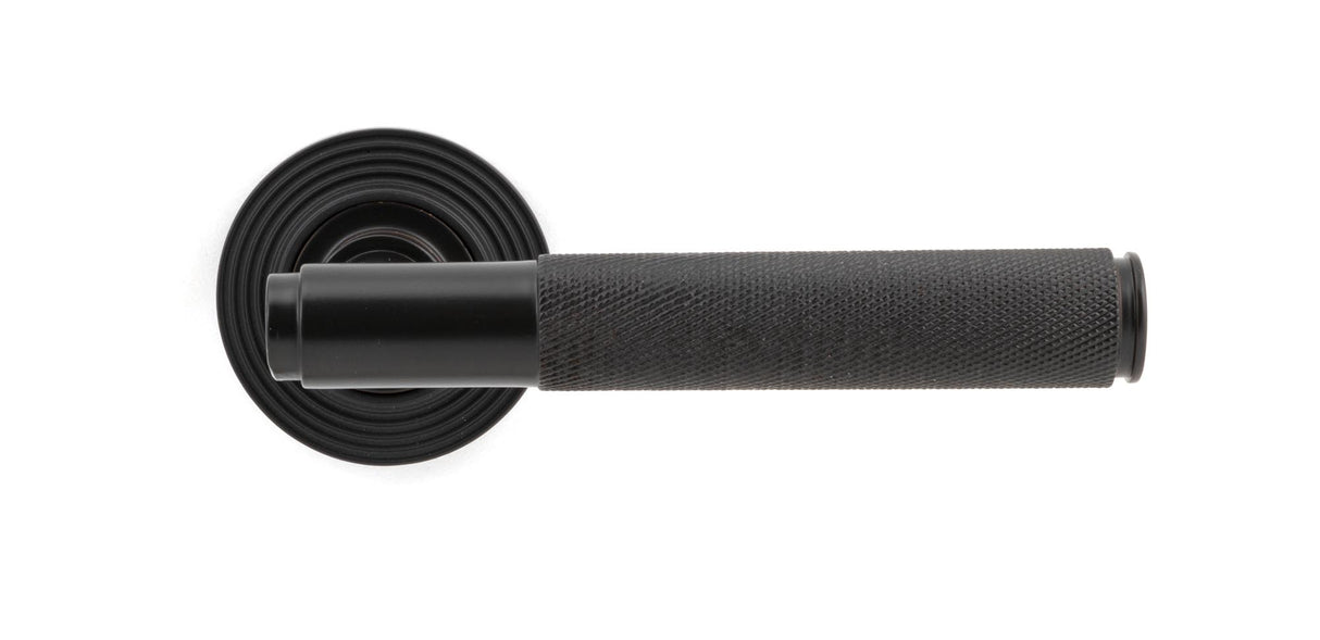 From The Anvil - Aged Bronze Brompton Lever on Rose Set (Beehive) - Unsprung | Sku. 50101 | Trade Door Handles.