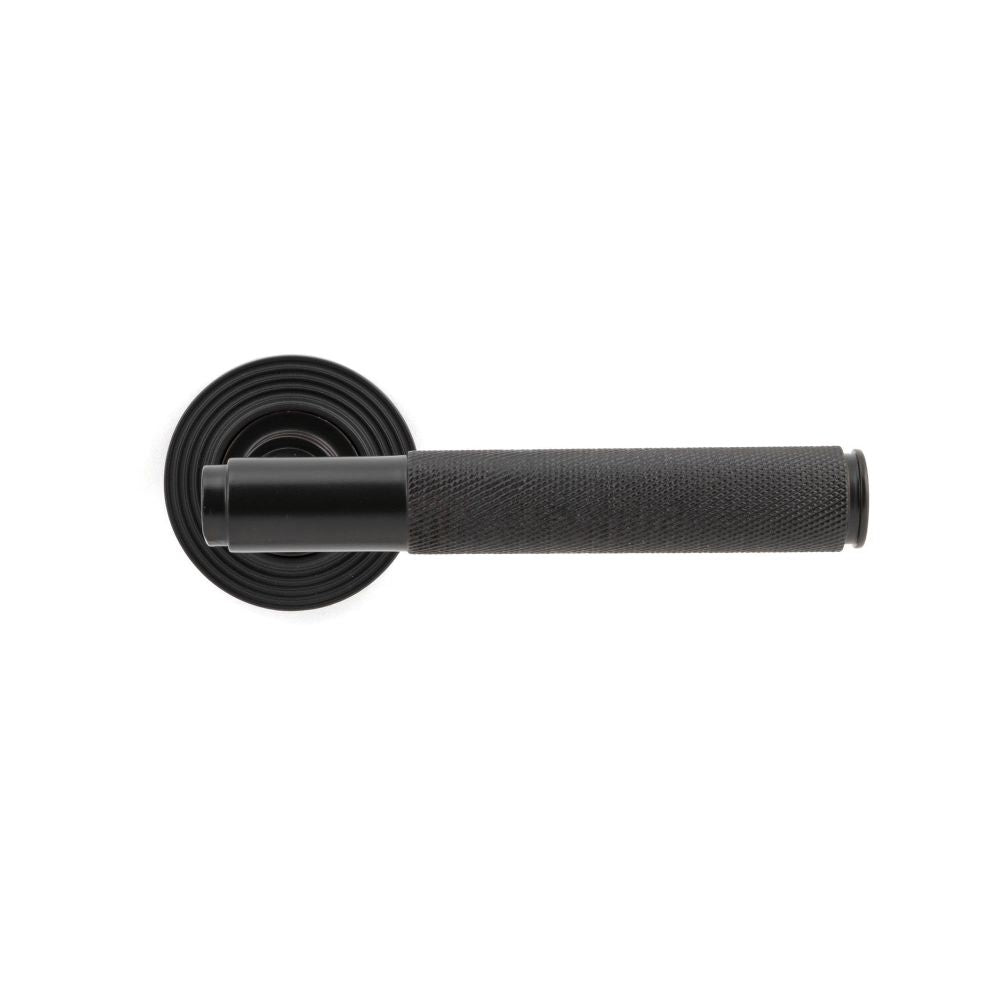 From The Anvil - Aged Bronze Brompton Lever on Rose Set (Beehive) - Unsprung | Sku. 50101 | Trade Door Handles.