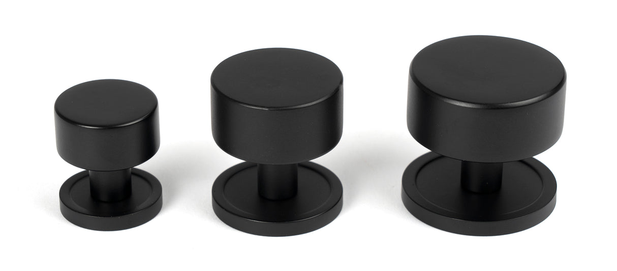 From The Anvil - Matt Black Kelso Cabinet Knob - 25mm (Plain) | Sku. 50337 | Trade Door Handles.