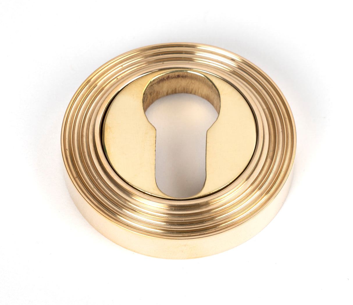 From The Anvil - Polished Brass Round Euro Escutcheon (Beehive) | Sku. 50594 | Trade Door Handles.