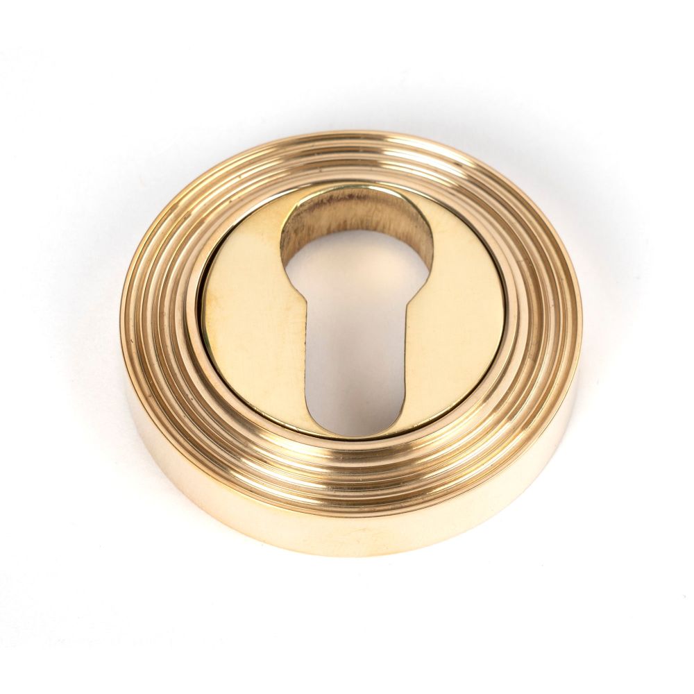 From The Anvil - Polished Brass Round Euro Escutcheon (Beehive) | Sku. 50594 | Trade Door Handles.
