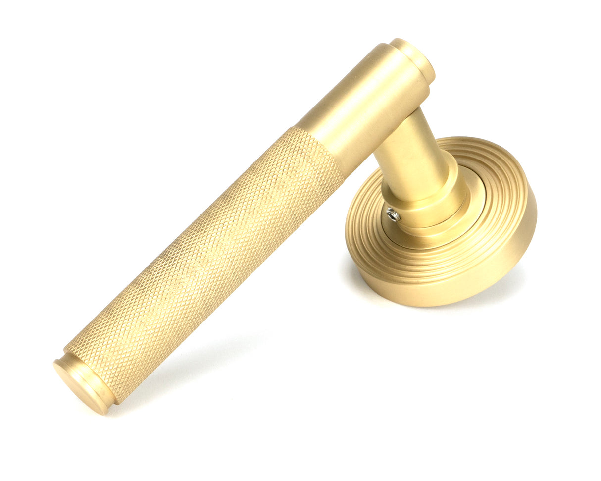 From The Anvil - Satin Brass Brompton Lever on Rose Set (Beehive) - Unsprung | Sku. 50849 | Trade Door Handles.