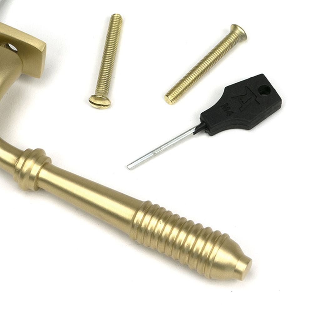 High quality images of the From The Anvil - Satin Brass Reeded Espag - LH | Sku. Anvil-52310 | available to order from Trade Door Handles, quick delivery at discounted prices.