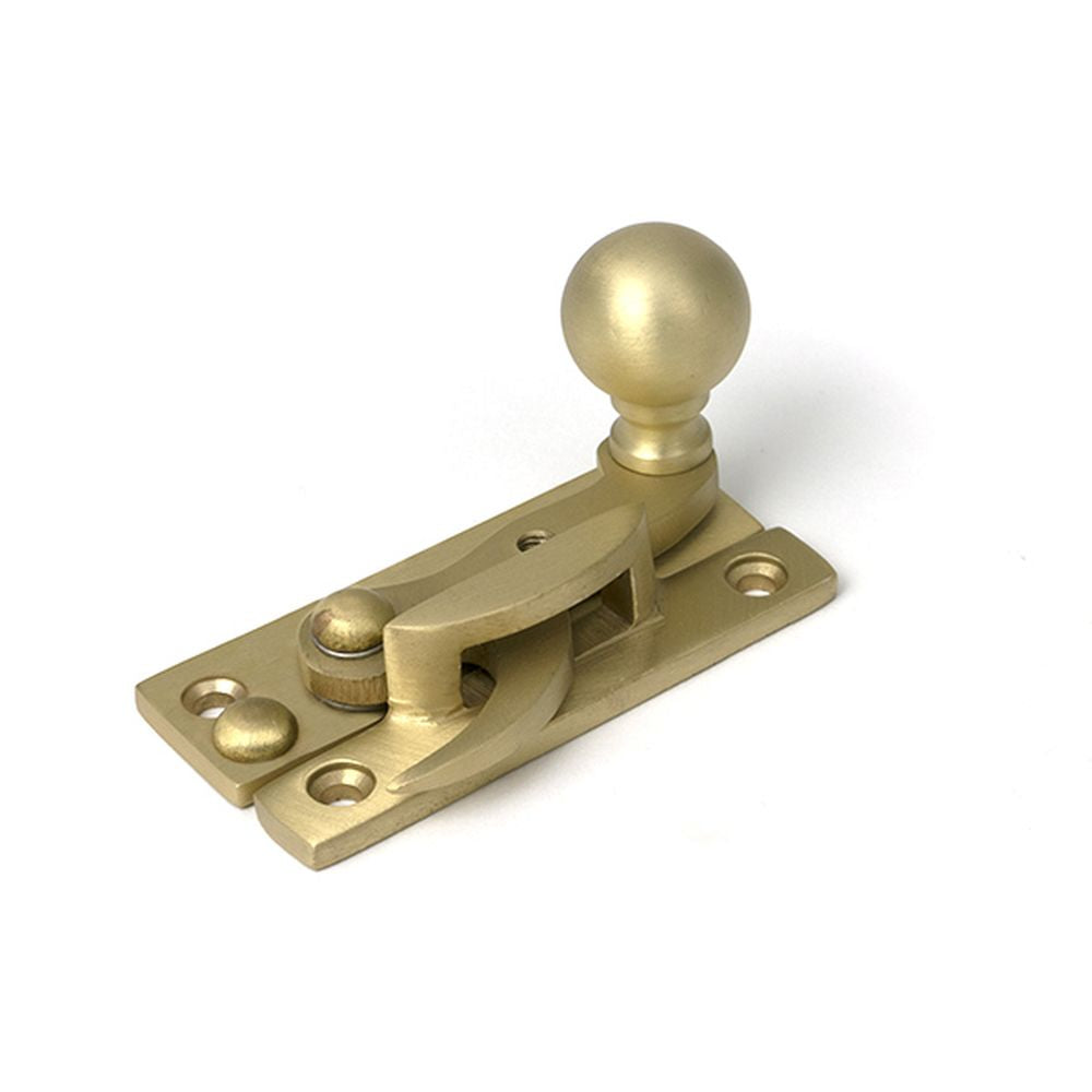 High quality images of the From The Anvil - Satin Brass Sash Hook Fastener | Sku. Anvil-52377 | available to order from Trade Door Handles, quick delivery at discounted prices.