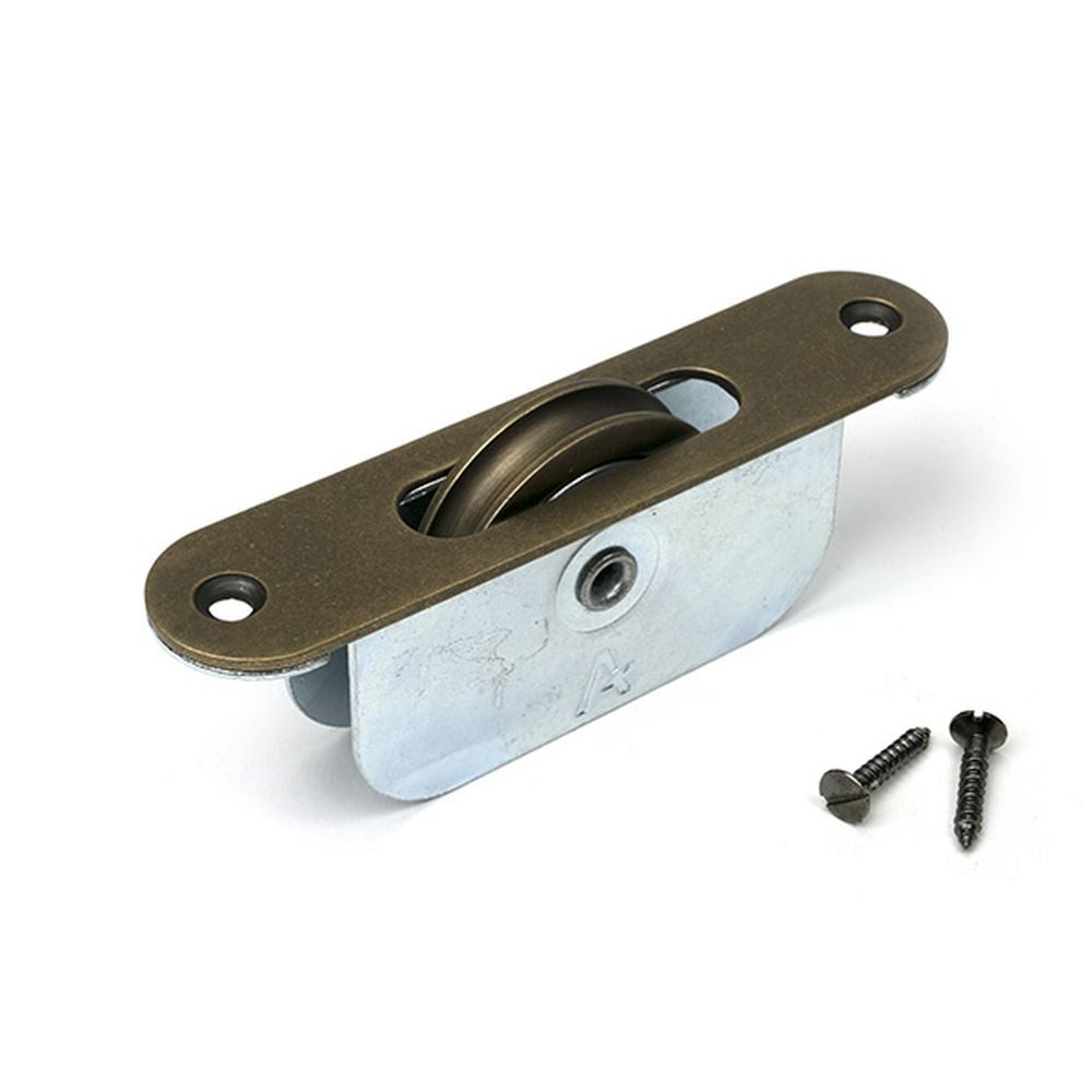 High quality images of the From The Anvil - Burnished Brass Radiused Sash Pulley 75kg | Sku. Anvil-52397 | available to order from Trade Door Handles, quick delivery at discounted prices.