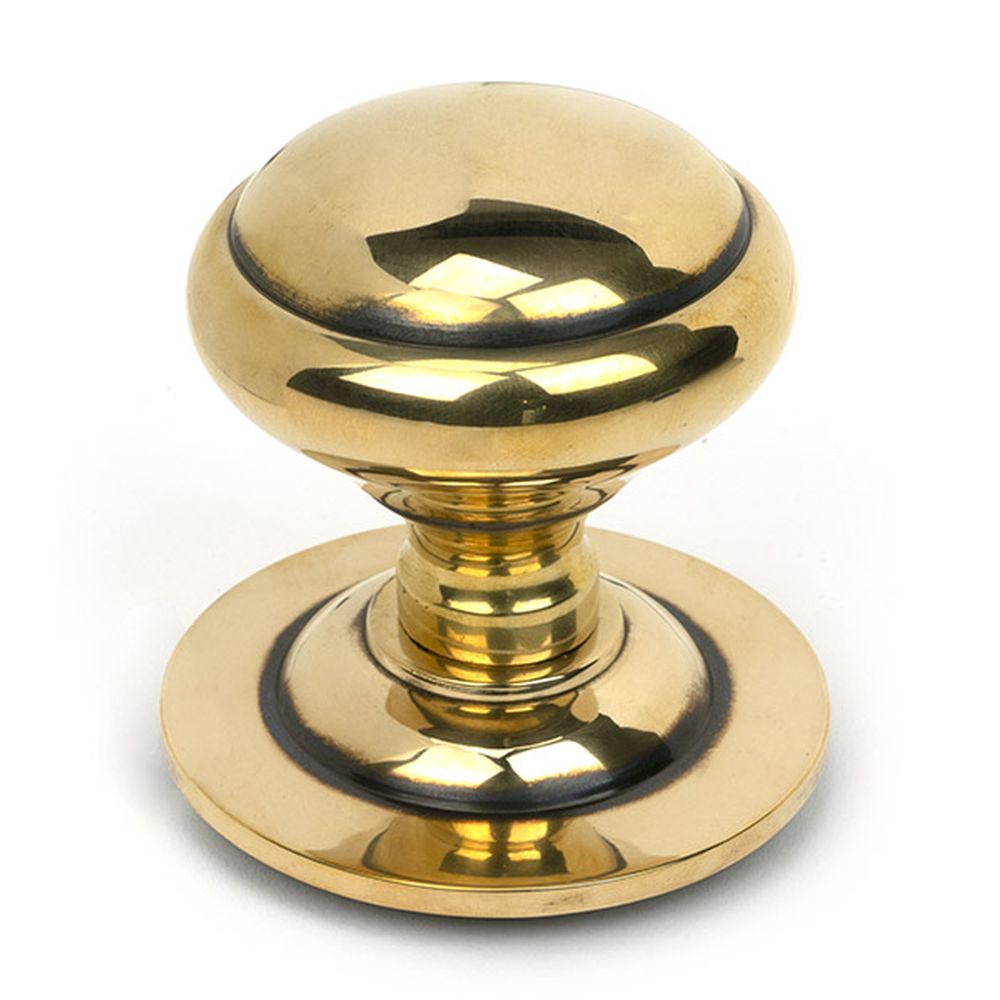 High quality images of the From The Anvil - Aged Brass Round Centre Door Knob | Sku. Anvil-52404 | available to order from Trade Door Handles, quick delivery at discounted prices.