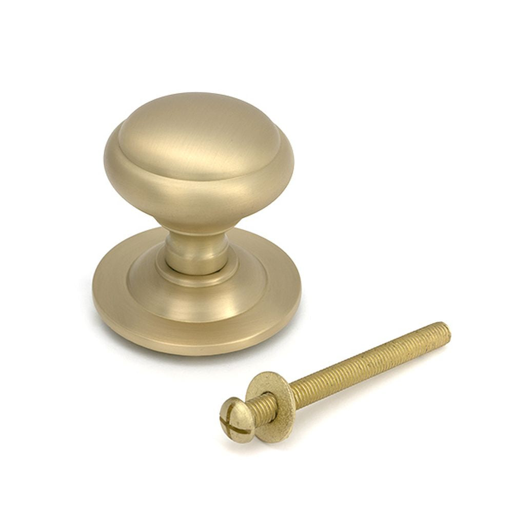 High quality images of the From The Anvil - Satin Brass Round Centre Door Knob | Sku. Anvil-52405 | available to order from Trade Door Handles, quick delivery at discounted prices.