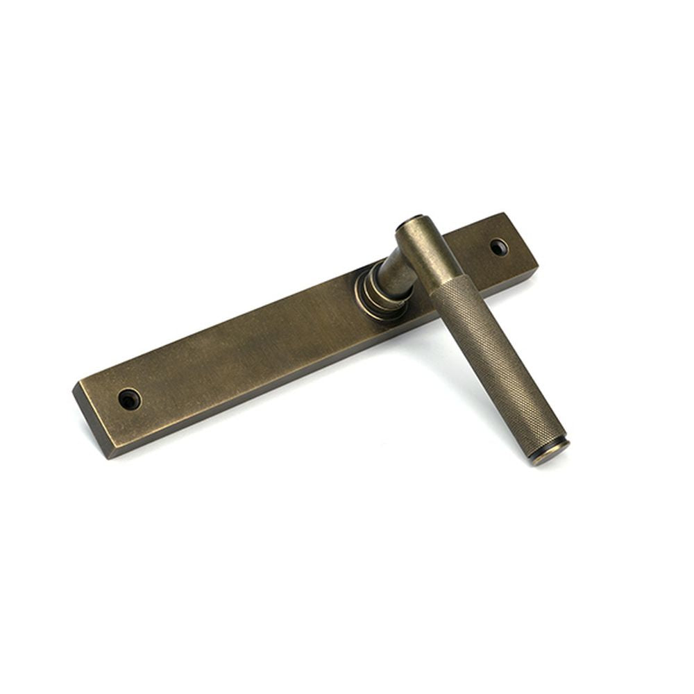 High quality images of the From The Anvil - Burnished Brass Brompton Slimline Lever Espag. Latch Set | Sku. Anvil-52418 | available to order from Trade Door Handles, quick delivery at discounted prices.