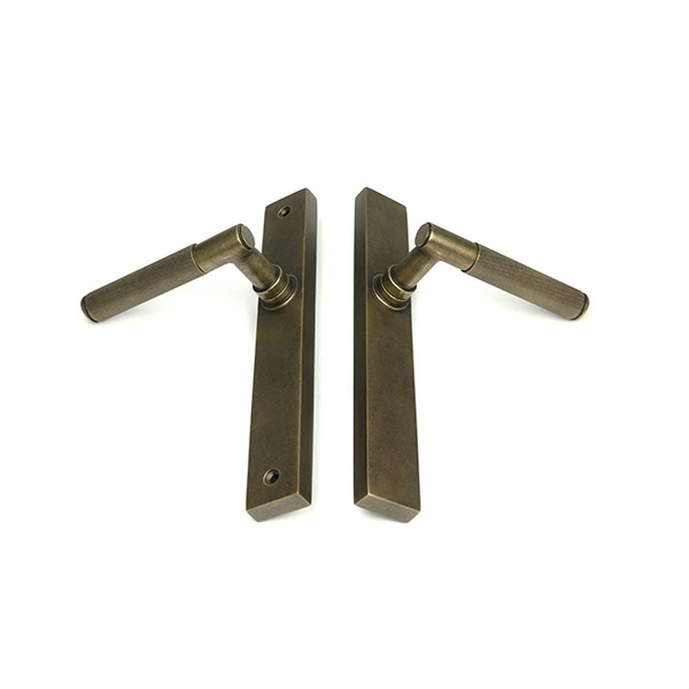 High quality images of the From The Anvil - Burnished Brass Brompton Slimline Lever Espag. Latch Set | Sku. Anvil-52418 | available to order from Trade Door Handles, quick delivery at discounted prices.